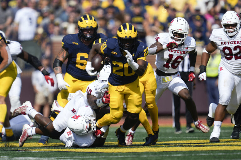 Michigan-Footballs-Dominant-Victory-Over-Rutgers-Harbaughs-Return-Triumphs-infopulselive